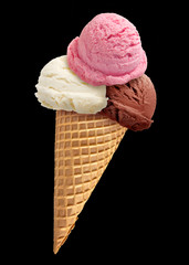 chocolate, strawberry and vanilla ice cream scoops with cone isolated on black background