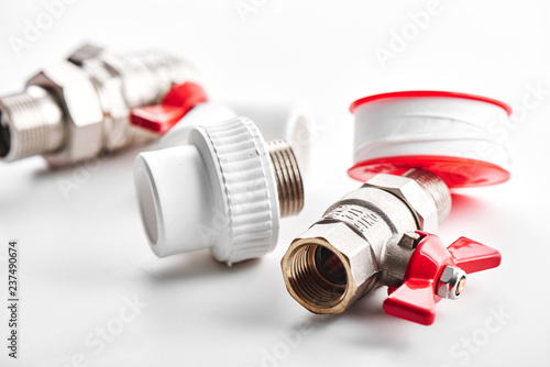 Cuadros en Lienzo plumbing tools and equipment on a white background closeup with copy space