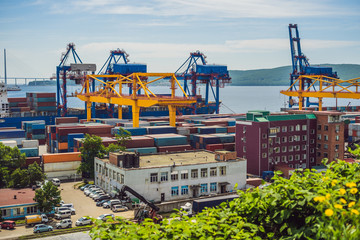 Container ship in import export and business logistic, By crane, Trade Port, Shipping cargo to harbor, Aerial view from drone, International transportation, Business logistics concept