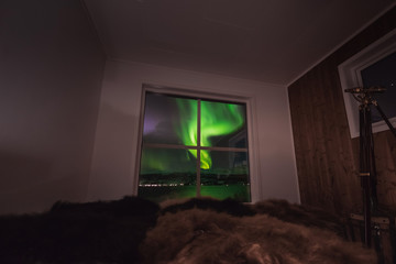 Wall Mural - the polar arctic northern lights aurora borealis sky star in norway svalbard in longyearbyen city mo