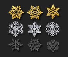 Set Of Beautiful Golden, Silver, Black Shiny Snowflakes Isolated On Black Background.