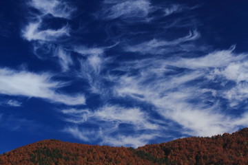 Wall Mural - clouds over mountains