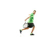 © master1305 - The one caucasian man playing tennis isolated on white background. Studio shot of fit young player at studio in motion or movement during sport game..