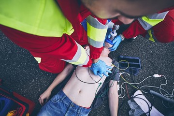 Wall Mural - Cardiopulmonary resuscitation on road