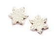 Two iced snowflake cookies isolated on white background with clipping path