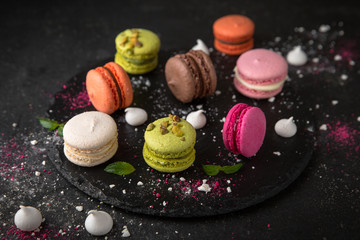 Colorful macarons cakes. Small French desert. Assorted Confectionery Range.