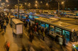 © alex57111 - passengers waiting and boarding buses at the bus terminal