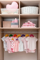 Poster - Wardrobe with cute baby clothes and home stuff