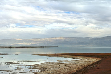 Dead Sea and overcast sky in cloudy weather