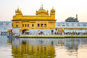 Golden temple and its reflection in water of holy pond