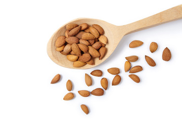 Wall Mural - Pelled almonds in woodeen spoon. Cut out.