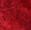 velvet texture background red color. Christmas festive baskground. expensive luxury, fabric, material, cloth.Copy space.