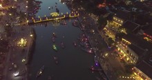 Aerial View Of Hoi An Old Town Or Hoian Ancient Town In Night. Royalty High-quality Free Stock Video Footage Top View Of Hoai River And Boat Traffic Hoi An. Hoi An Street And River In Night With Light