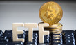 Bitcoin coin with ETF text Put on the keyboard, Concept Entering the Digital Money Fund.