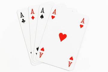 Leinwandbilder - Four playing cards of Aces isolated on white background