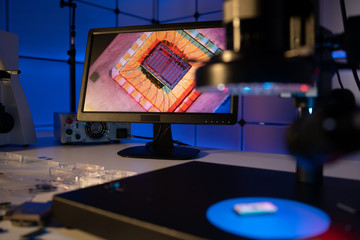 Poster - Laboratory of semiconductor chips. The development of modern electronics. crystal chip in the microscope