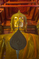 Gold Big Buddha Situated in the Buddhist temple at Wat Phanan Choeng Ayutthaya Province, Thailand.