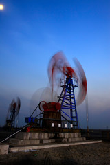 Wall Mural - crank balanced beam pumping unit in a oilfield