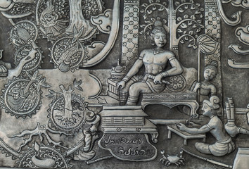 Wall Mural - Thai style silver carving art on temple wall , Wat Srisuphan ,Chiang Mai, Thailand.