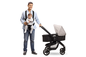 Sticker - Young father with a stroller and a baby in a carrier