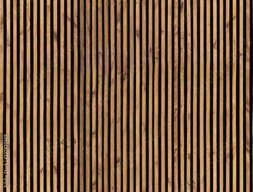 Fotografía Seamless pattern of modern wall paneling with vertical wooden slats for background