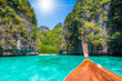 Landscape with  longtail boat on Loh Samah Bay, Phi Phi island, Thailand