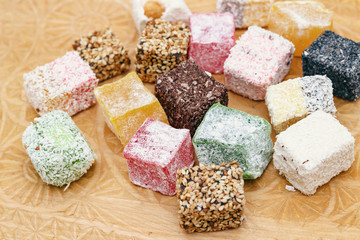 Canvas Print - Image of Turkish delight on a carved wooden board