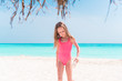 © travnikovstudio - Portrait of adorable little girl at beach on her summer vacation