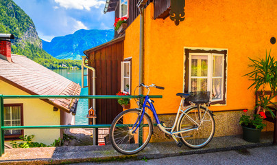 Wall Mural - Austrian Alpine house with bicycle in Hallstatt village, Austrian Alps,  Salzkammergut, Austria, Europe