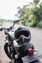 Black Helmet On A Black Custom Motorcycle