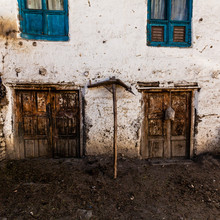 Old Fashioned Traditional Dirty Wood Windows And Doors In Small Mountain Village In Nepal.