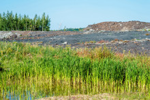 Desert Landscape After Mining Activities. The Destruction Of Forests Due To The Overburden Dump Pit