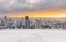 Osaka City Skyline, Downtown Business District In Sunset With Empty Concrete Floor