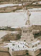 Sticker - Overhead aerial view of Statue of Liberty from helicopter, New York City in winter