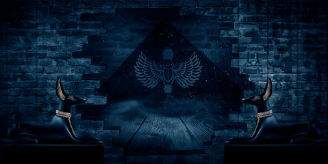 anubis of ancient egypt (god of death). dark abstract egyptian background, dark room with smoke, spa