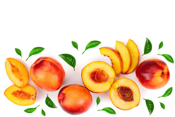 Wall Mural - ripe nectarine with leaves isolated on white background with copy space for your text. Top view. Flat lay pattern