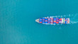 © Kalyakan - Aerial view cargo container ship carrying container for import and export, business logistic and transportation by ship in open sea
