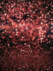 Wall Mural - Living Coral color. Bright glitter bokeh & sparkles on black holiday background. Color of the Year 2019. Valentine's day.