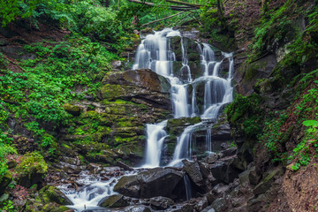 Sticker - Beautiful high waterfall deep in the Carpathian mountains.