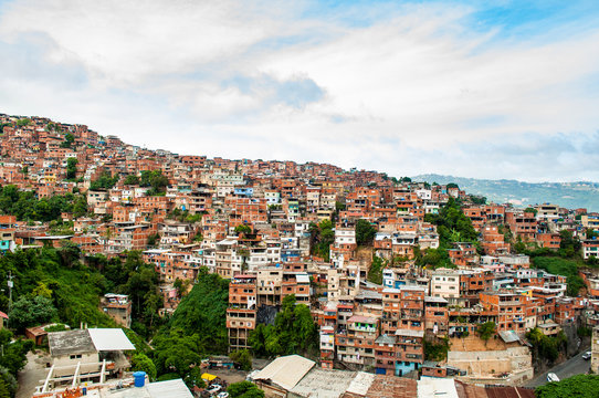 close up above view of shanty town and slums with daylight in south american city with people