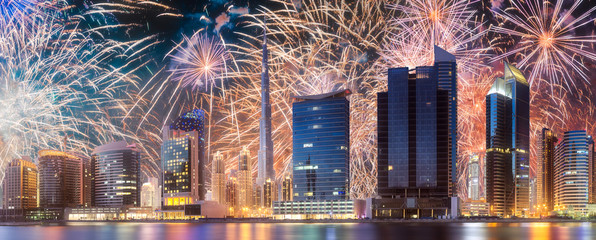 Wall Mural - Beautiful fireworks above Dubai Business bay, UAE