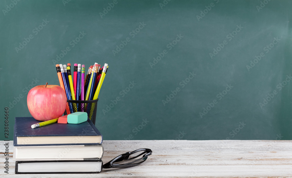 Back to school concept including books and stationery supplies with ...