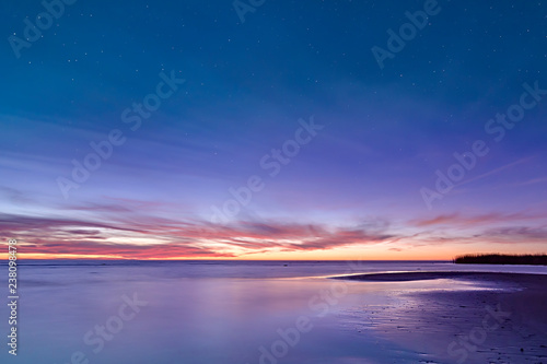 Photographie Dramatic Sunset in Long Exposure for background