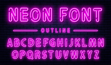 Neon Alphabet With Numbers. Purple Neon Font, Fluorescent Lamps On Brick Wall Background, Outline Style Font