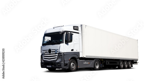 Cuadros en Lienzo Freigestellter LKW, fahrend auf Straße fotografiert
