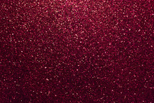 Dark Red Sparkling Background From Small Sequins, Closeup. Brilliant Backdrop.