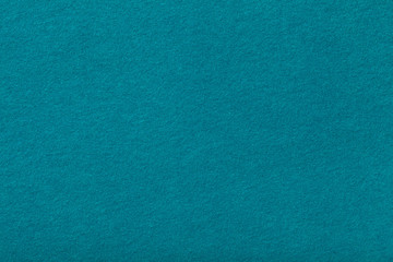 Wall Mural - Dark turquoise matt suede fabric closeup. Velvet texture of felt.