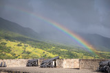Fototapeta Tęcza - Rainbow above a cannons at Brimstone Hill Fortress on Saint Kitts. West Indies