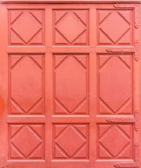 Wall Mural - Traditional red entrance gate of Thai temple. The designs use patterns of flowers.