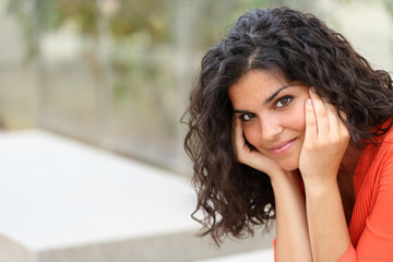 Beauty girl looking at camera in a park